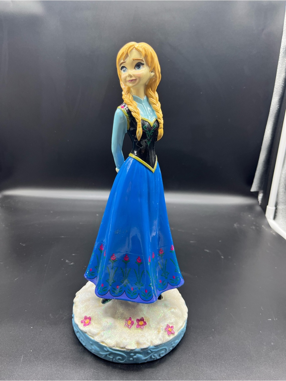 Disney Anna Figurine from the movie Frozen in Blue, Black, Blonde and Cream.